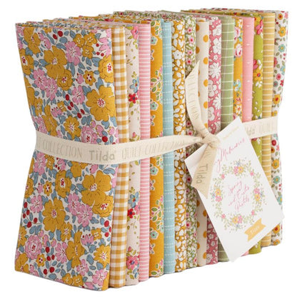 Fat Quarter bundle Tilda Creating Memories Spring is a seasonal colorway within the "Creating Memories" fabric collection designed by Tone Finnanger for Tilda Fabrics. This collection features a palette of Spring and Easter Pastels, including soft yellows, greens, pinks, and creams with hints of teal. The collection consists of small-patterned "seasonal basics," including ditsy florals, cute dots, and slender stripes
